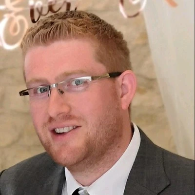 Headshot of James Robinson